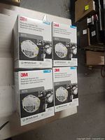 Four sealed boxes of 3M 8210 N95 respirator masks