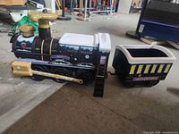 Side view locomotive and tender connected