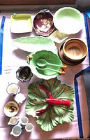 Group shot of all ceramic and wooden serving pieces