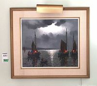 Full view of framed painting with attached picture light