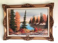 Full view of framed landscape painting