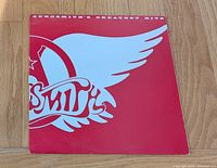 Front of sleeve showing Aerosmith winged logo