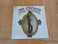 Front cover with title, artist, A&M SP-6002 logo