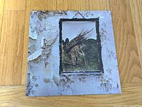 Front jacket with iconic old man carrying sticks image