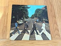 Front album jacket featuring the iconic crosswalk photo