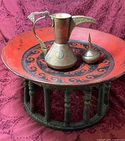 Full view of tray with coffee pot and copper container on top