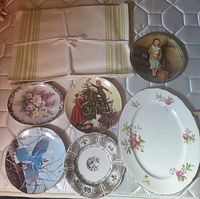 All six plates and placemat stack displayed on surface