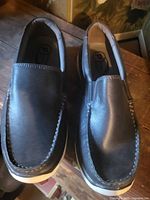 Top view of both shoes showing overall style, condition and size marking on insole