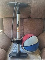 Floor pump and basketball together