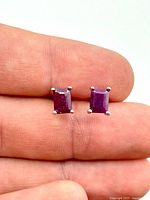 close-up front view of ruby studs