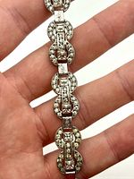 Front view close-up of bracelet links and rhinestones