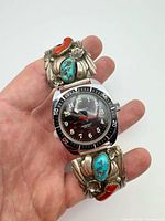 Overall view of watch and Navajo bracelet in hand
