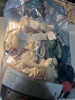 Bag filled with assorted yarn skeins