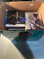 Box showing multiple Blu-ray cases