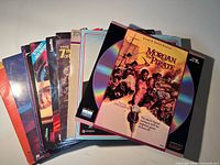 Stack of LaserDiscs showing Morgan the Pirate on top and additional titles beneath