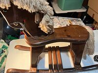 Full side view of wooden rocking horse