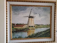 Full framed painting showing windmill landscape