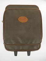 Front view showing exterior material, leather trim and logo patch