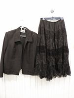 Jacket and skirt hanging side by side
