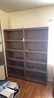 Front view of both matching bookcases showing size and finish