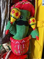 Plush dancing cactus with maracas in red pot