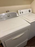Both Whirlpool laundry appliances side by side