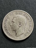 Obverse showing left-facing portrait of George VI and legend GEORGIVS VI DEI GRATIA REX