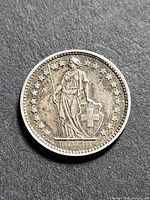 Obverse of 1957 Swiss 1/2 franc coin showing Helvetia