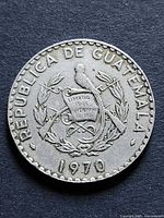 Obverse of 1970 Guatemala 25 centavos coin showing coat of arms and date