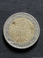 Obverse showing tree of life design, date 2001