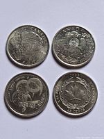Obverse designs of the four commemorative quarters