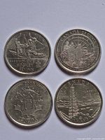 Four commemorative quarters reverse sides