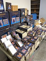 Table filled with stacked Fontanini boxed items