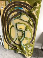 Full view of preformed layout base showing installed track, scenery and terrain