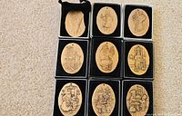 Nine oval ornaments in presentation boxes