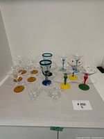 Full lot showing all 18 pieces grouped on tabletop