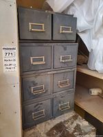 Gray metal cabinet with six drawers
