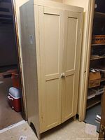 Front view of closed cabinet showing overall appearance and doors