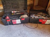Both Jobmate tool boxes open showing contents of fasteners