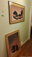 Both framed prints displayed for size comparison