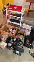 overall lot with cart, keyboards, crate, cables and DVDs