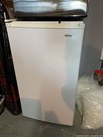Front view of white compact refrigerator