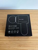 Front of retail box showing DoctorAir Recovery Gun branding