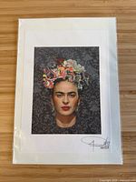 Front view of signed Frida Kahlo print in sleeve
