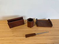 Full view of all four walnut desk pieces