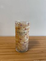 Front view of floral glass Lollia Breathe No.019 candle