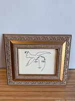 Front view of framed art piece