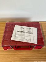 Closed case with instructions sheet on lid