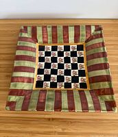 Front view showing striped rim and checkerboard center