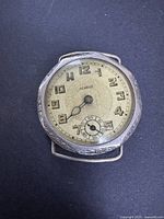 Front view of Albert trench watch showing dial, numerals and subsidiary seconds